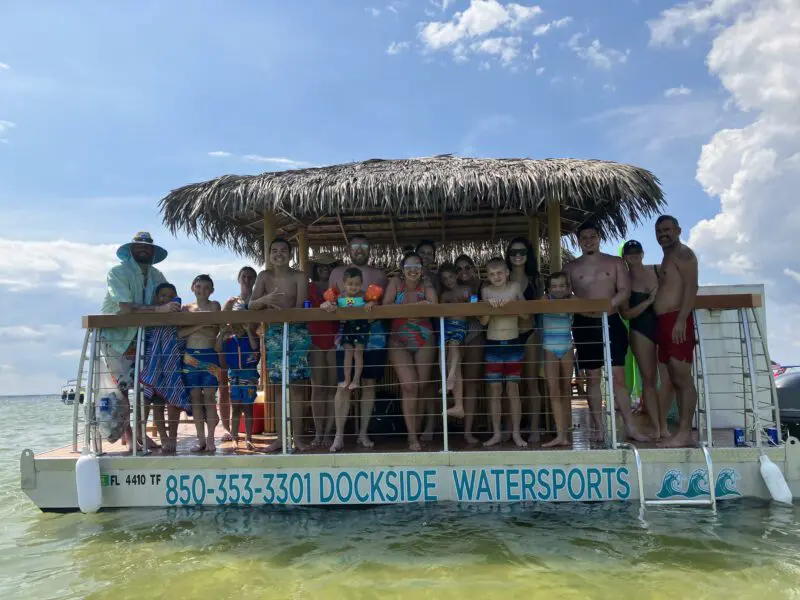 Destin tiki boat rental with large family having fun